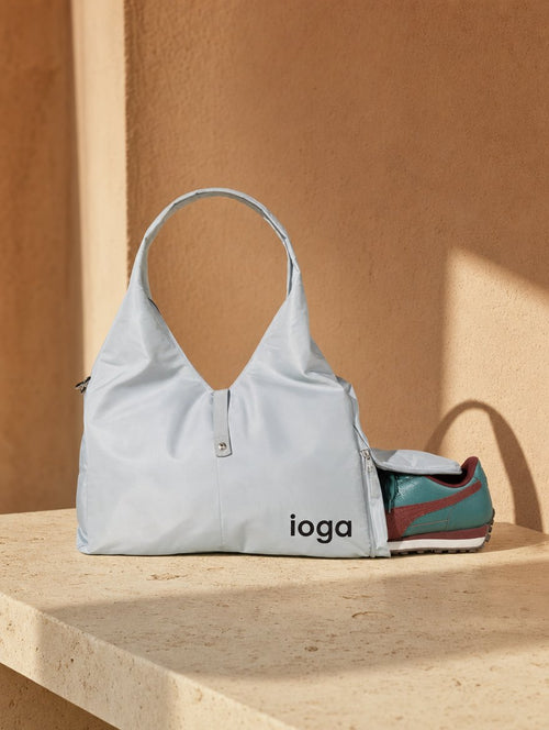 Bolsa deportiva de yoga ioga azul hielo sobre cantera mexicana